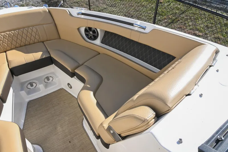 Slide: The Image of Luxurious interior seating of 2020 Sea Ray SLX 250 boat with tan upholstery. - 33