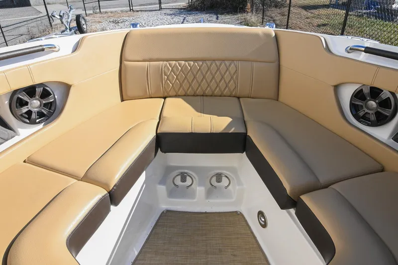 Slide: The Image of Luxurious seating area on 2020 Sea Ray SLX 250 boat with tan upholstery. - 35