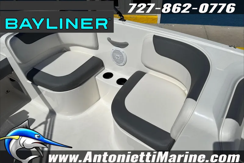 Slide: The Image of 2026 Bayliner Element E16 boat interior with seating, cup holders, and speaker. - 27