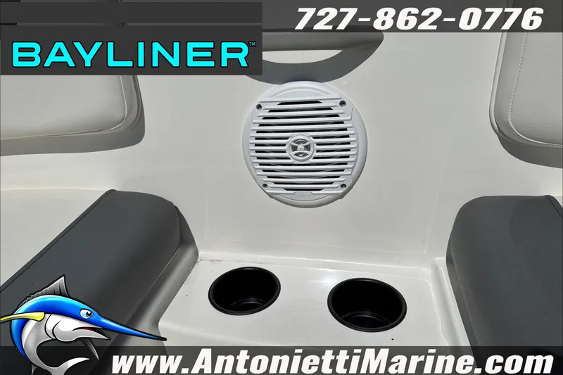 Slide: The Image of 2026 Bayliner Element E16 boat interior with speaker and cup holders. - 28