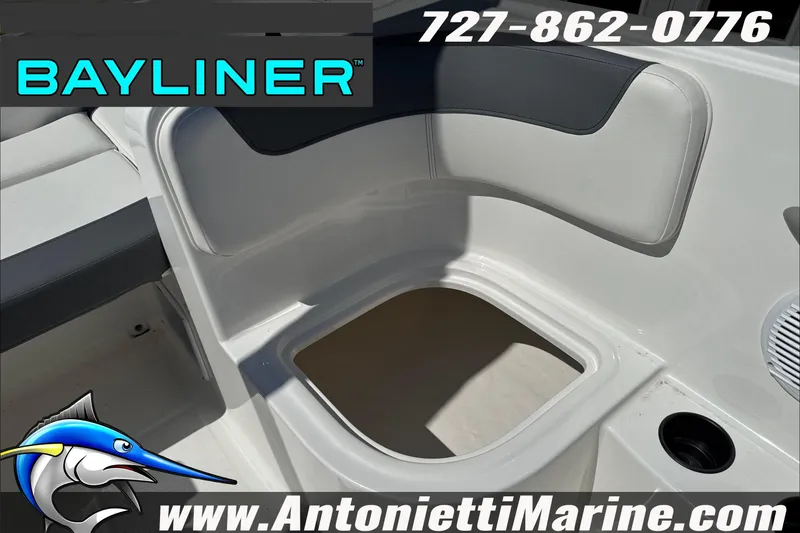 Slide: The Image of Interior view of 2026 Bayliner Element E16 boat, featuring seating and storage. - 29