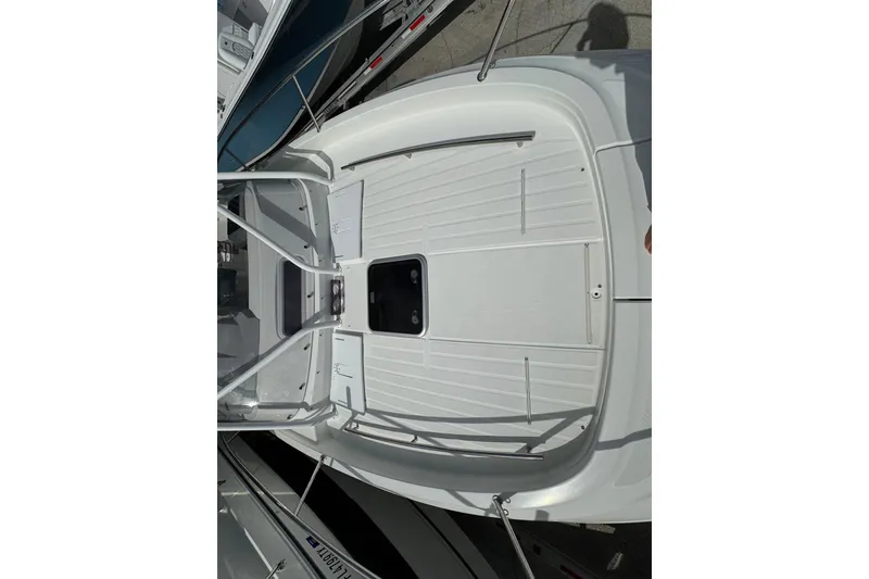 Slide: The Image of 2021 Jeanneau Leader 9.0 WA boat deck, featuring sleek design and spacious layout. - 14