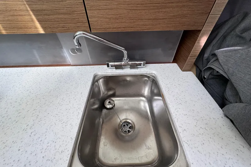 Slide: The Image of Stainless steel sink with modern faucet in 2021 Jeanneau Leader 9.0 WA boat. - 18