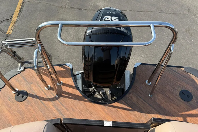 Slide: The Image of 2017 South Bay 523RS-DC boat with outboard motor and stainless steel railings. - 22