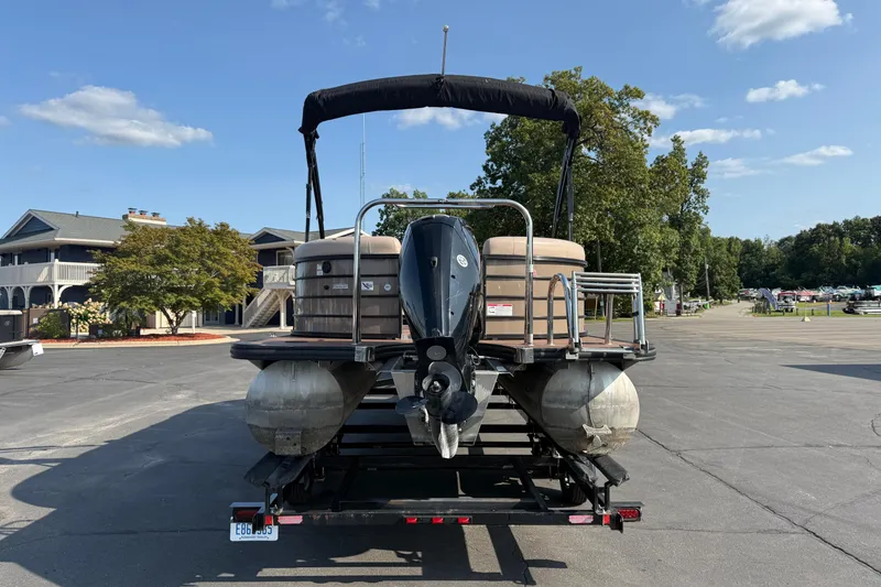 Slide: The Image of 2017 South Bay 523RS-DC pontoon boat on trailer, parked outdoors. - 6