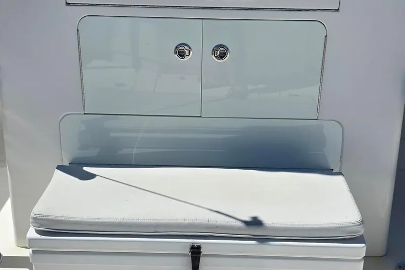 Slide: The Image of 2020 SeaVee 390Z boat seating area with storage compartments. - 11