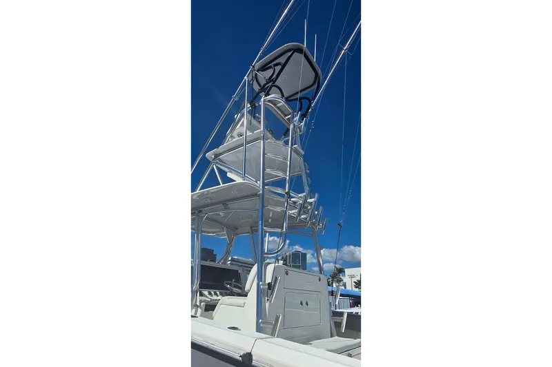 Slide: The Image of 2020 SeaVee 390Z boat with tower against clear blue sky. - 21