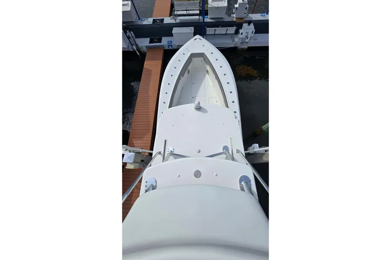 Slide: The Image of Aerial view of 2020 SeaVee 390Z boat docked at a marina. - 25