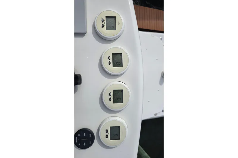 Slide: The Image of Control panel of a 2020 SeaVee 390Z boat with digital displays. - 27