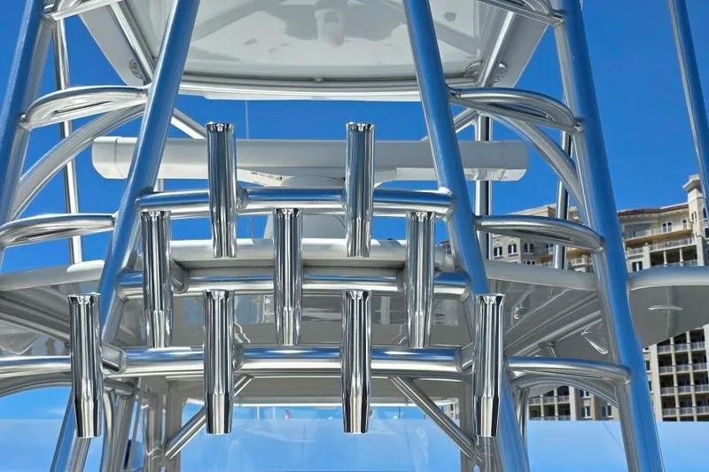 Slide: The Image of 2020 SeaVee 390Z boat docked at marina under clear blue sky. - 4