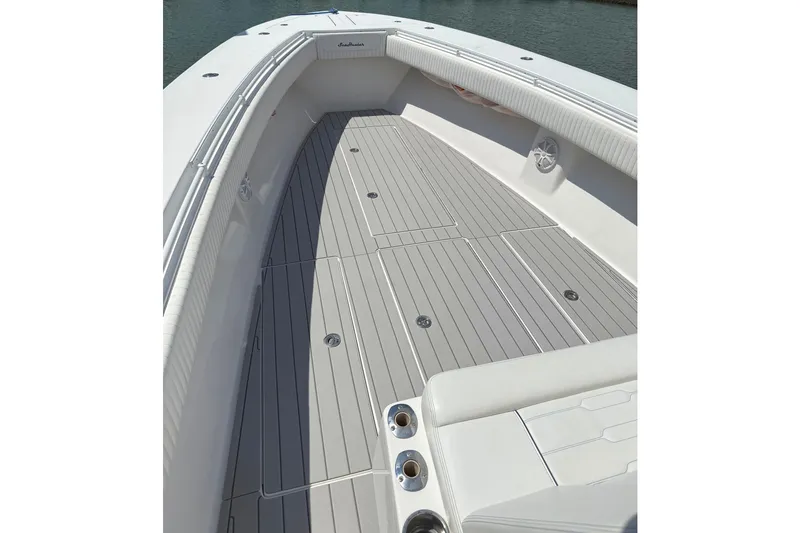 Slide: The Image of 2007 SeaHunter 40 boat deck with sleek, modern design and spacious layout. - 12