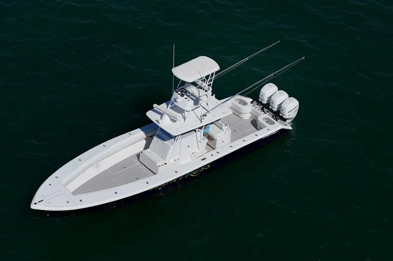 Slide: The Image of 2007 SeaHunter 40 boat on open water, aerial view. - 3
