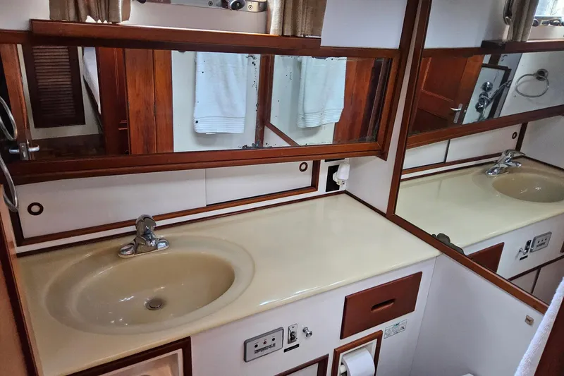 Slide: The Image of Bathroom interior of 1997 Grand Banks 46 Europa yacht with sink and mirror. - 10