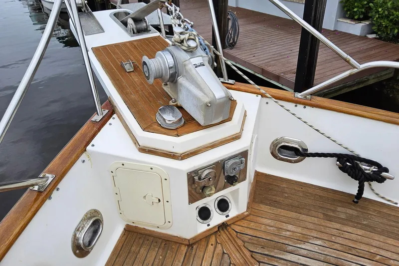 Slide: The Image of Deck of 1997 Grand Banks 46 Europa yacht with winch and mooring equipment. - 18