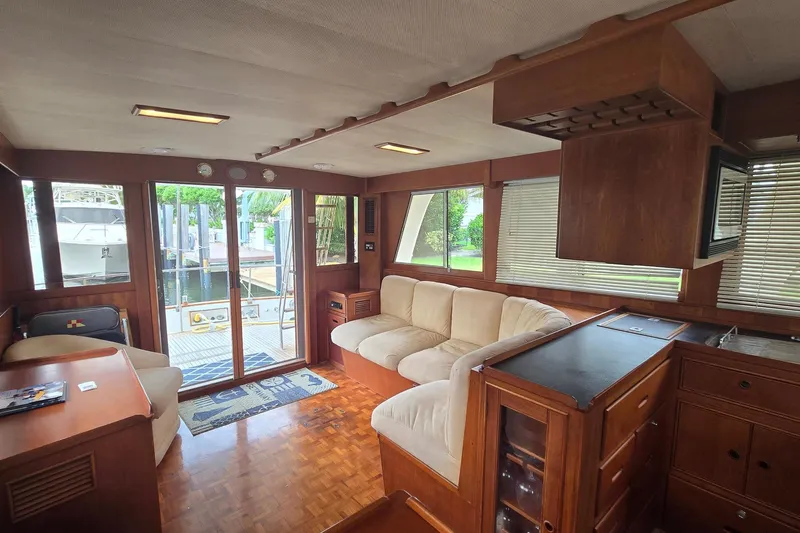 Slide: The Image of Interior of 1997 Grand Banks 46 Europa yacht with wood finish and comfortable seating. - 6