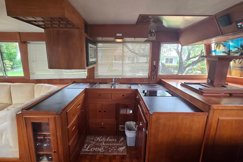 Slide: The Image of Interior of 1997 Grand Banks 46 Europa yacht with wooden kitchen and modern appliances. - 7