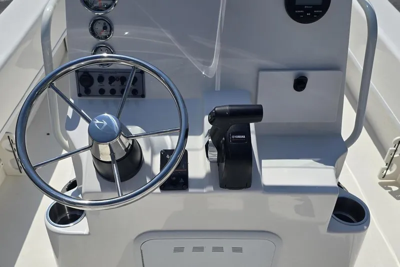 Slide: The Image of Steering console of 2026 Sundance B22CCR boat with Yamaha controls. - 7
