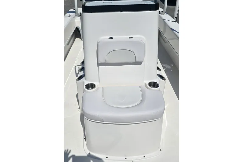 Slide: The Image of 2026 Sundance B22CCR boat seat with cup holders and storage compartment. - 8