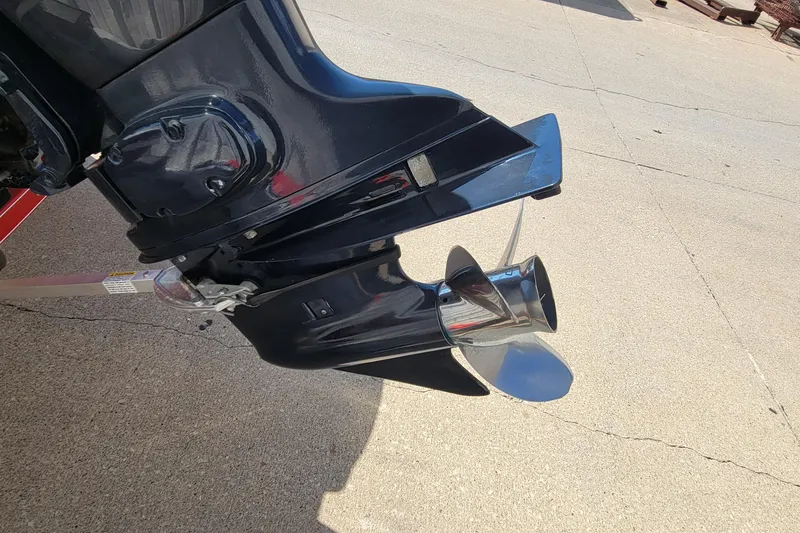 Slide: The Image of Outboard motor propeller of a 2000 Nitro 640LX boat on concrete surface. - 7