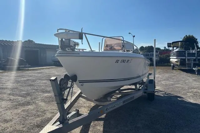 Slide: The Image of 2008 Clearwater 180 center console boat on trailer in outdoor storage area. - 5