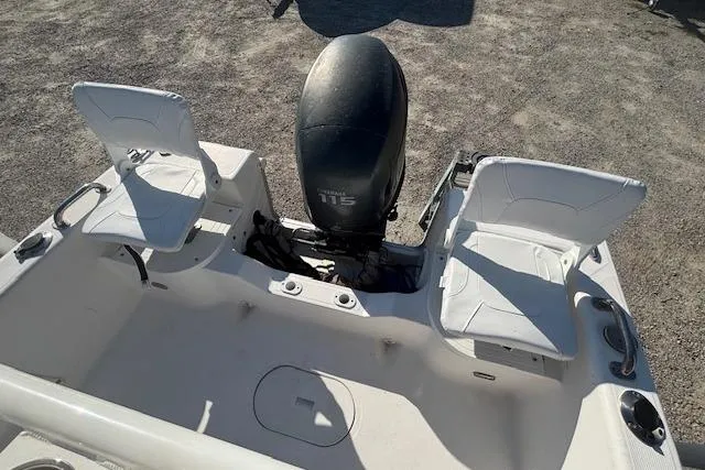 Slide: The Image of 2008 Clearwater 180 center console boat with dual seats and 115 HP outboard motor. - 14