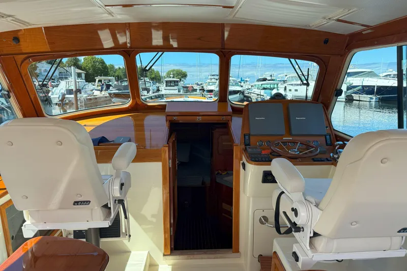 Slide: The Image of Interior view of 2003 Hinckley Talaria 40 yacht cockpit with helm and seating. - 7