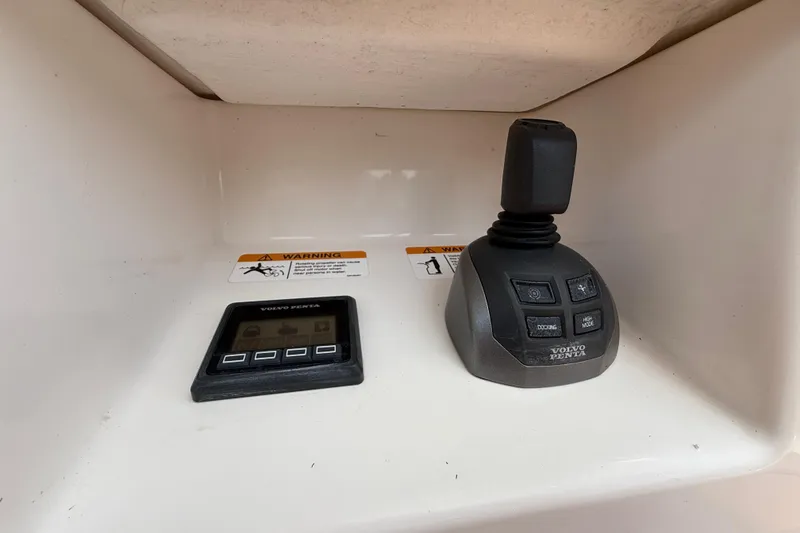 Slide: The Image of Control panel of 2021 Ranger Tugs R-41CB with Volvo Penta joystick and display. - 13