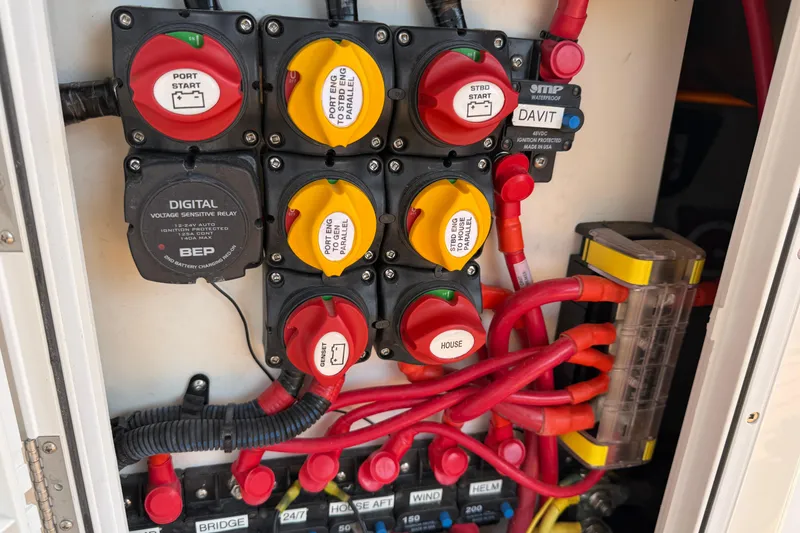 Slide: The Image of Electrical panel of 2021 Ranger Tugs R-41CB with switches and wiring. - 15