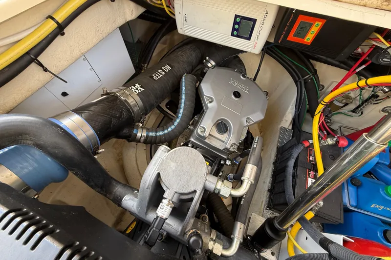 Slide: The Image of Engine compartment of 2021 Ranger Tugs R-41CB with visible wiring and components. - 61