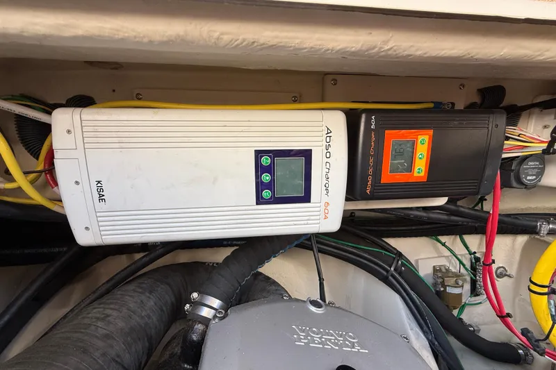 Slide: The Image of Electrical components in a 2021 Ranger Tugs R-41CB boat engine compartment. - 62