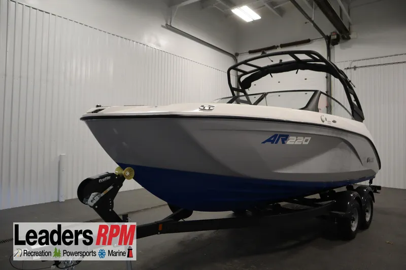 The Image of 2026 Yamaha Boats AR220 in showroom, featuring sleek design and modern features. - 0