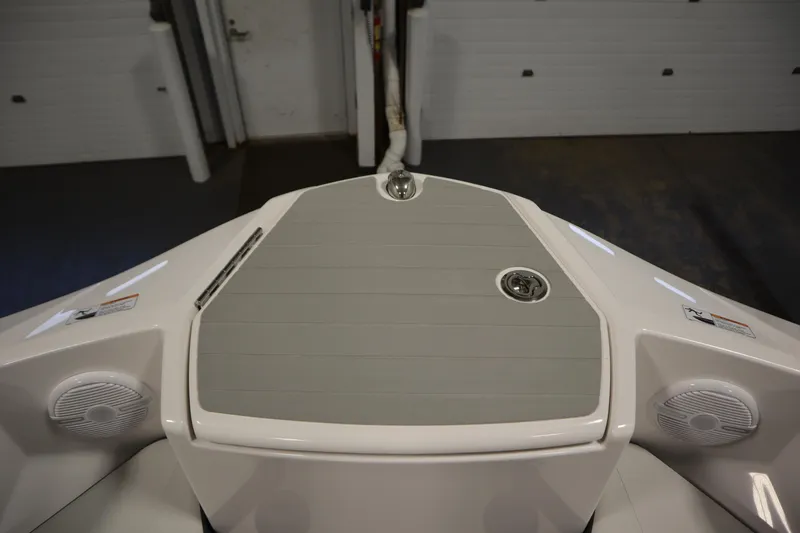 Slide: The Image of 2026 Yamaha Boats AR220 bow with speakers and sleek design. - 11