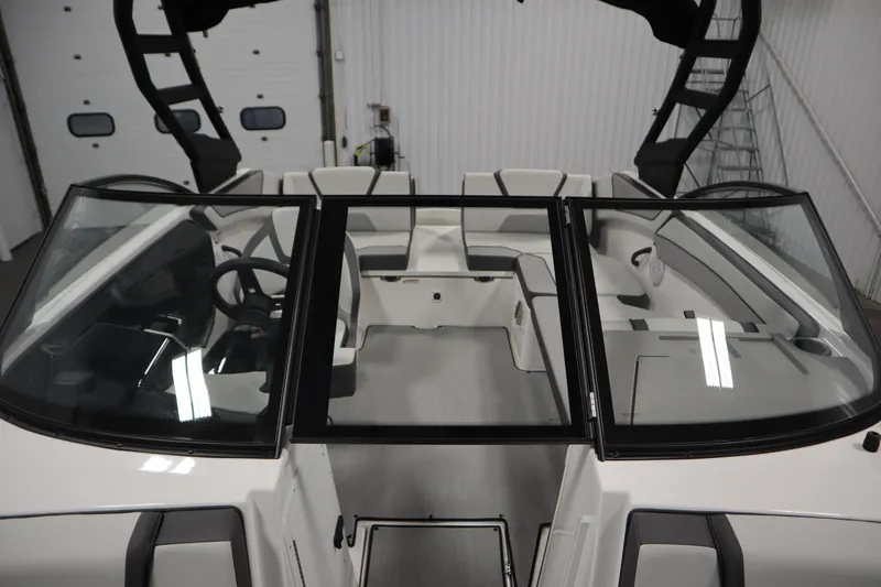 Slide: The Image of 2026 Yamaha Boats AR220 interior with sleek seating and modern design. - 17