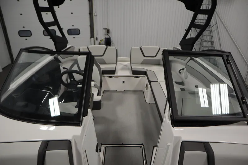 Slide: The Image of 2026 Yamaha Boats AR220 interior with modern seating and sleek design. - 18