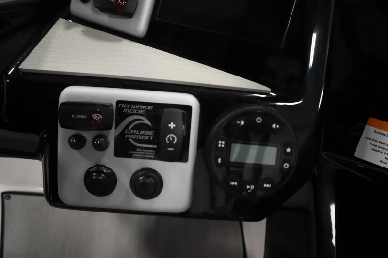 Slide: The Image of Control panel of 2026 Yamaha Boats AR220 featuring no wake mode and cruise assist. - 25