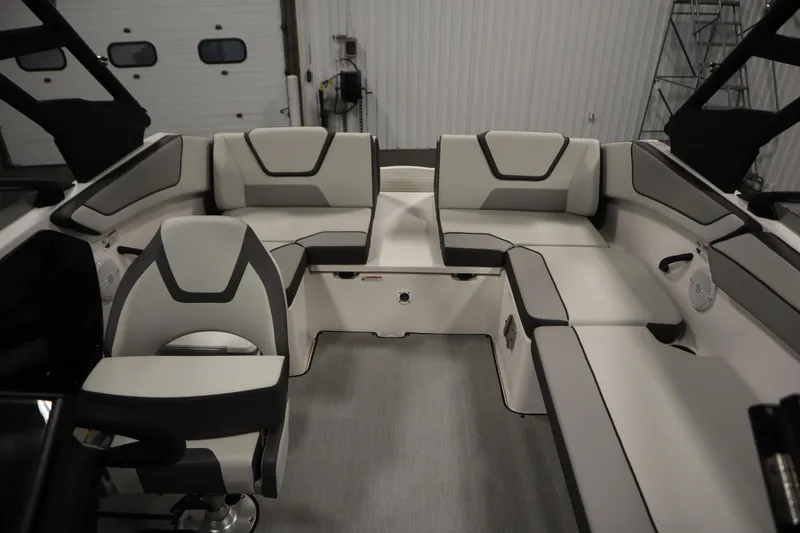 Slide: The Image of 2026 Yamaha Boats AR220 interior with modern seating and sleek design. - 33