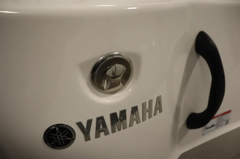 Slide: The Image of 2026 Yamaha Boats AR220 logo and handle detail on white surface. - 41