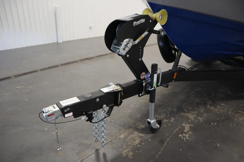 Slide: The Image of Trailer hitch of 2026 Yamaha Boats AR220 in a garage setting. - 42