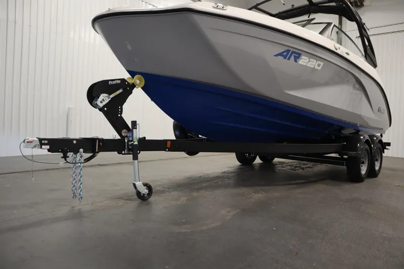 Slide: The Image of 2026 Yamaha Boats AR220 on trailer in indoor setting. - 44