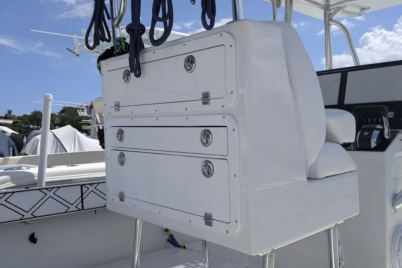 Slide: The Image of Control panel of a 1985 Contender 25 Sport boat with Simrad electronics. - 11