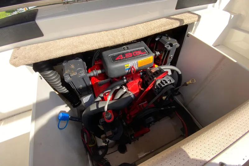 Slide: The Image of Engine compartment of 2006 Chaparral 190 SSi boat, featuring a 4.3GL engine. - 15