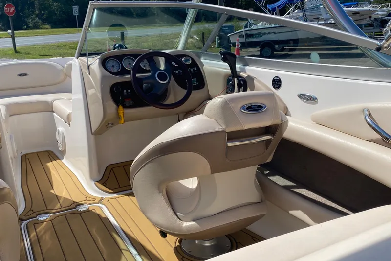 Slide: The Image of 2006 Chaparral 190 SSi boat interior with steering wheel and seating. - 8