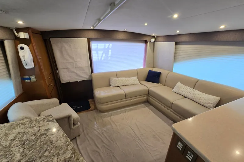 Slide: The Image of Luxurious interior of 2004 Ocean Yachts 50 Super Sport with plush seating and modern decor. - 10