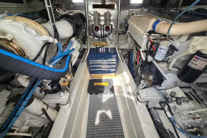 Slide: The Image of Engine room of 2004 Ocean Yachts 50 Super Sport with tools and equipment. - 48