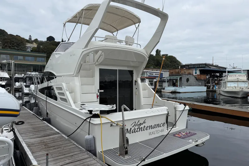 Slide: The Image of 2007 Carver 35 Super Sport yacht docked at marina, overcast sky. - 24