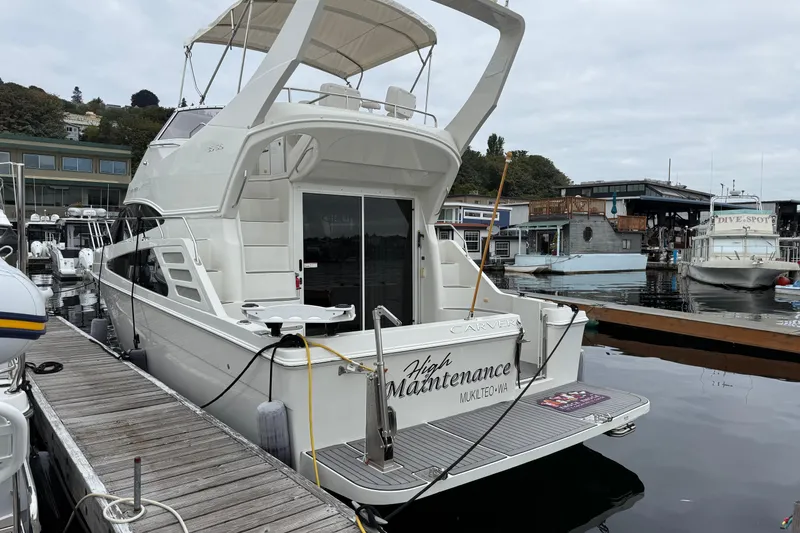 The Image of 2007 Carver 35 Super Sport yacht docked at marina, rear view. - 0