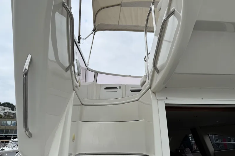 Slide: The Image of Staircase on 2007 Carver 35 Super Sport yacht with stainless steel railings. - 5