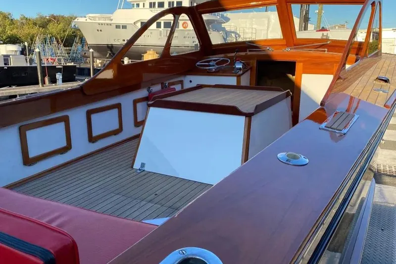 Slide: The Image of 1959 Forest E Johnson Prowler boat with polished wood interior and classic design. - 7