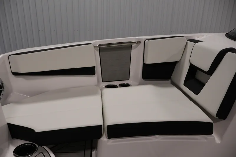 Slide: The Image of 2026 Yamaha Boats 222S interior seating with white and black upholstery. - 13