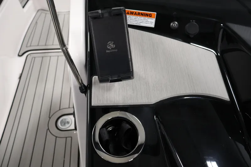 Slide: The Image of Cup holder and phone holder on 2026 Yamaha Boats 222S deck. - 19